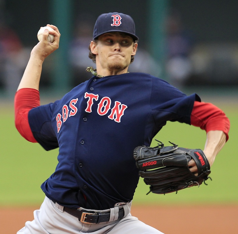 Boston Red Sox starter Clay Buchholz pitches in the first inning of a baseball game against the Cleveland Indians, Friday, Aug. 10, 2012, in Cleveland. (AP Photo/Tony Dejak)