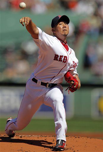Boston Red Sox starting pitcher Daisuke Matsuzaka delivers a pitch against the Kansas City Royals in the first inning of a baseball game at Fenway Park, Monday, Aug. 27, 2012. (AP Photo/Steven Senne)