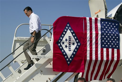 Republican presidential candidate Mitt Romney arrives at Adams Field Airport for a fundraising event on Wednesday in Little Rock, Ark.