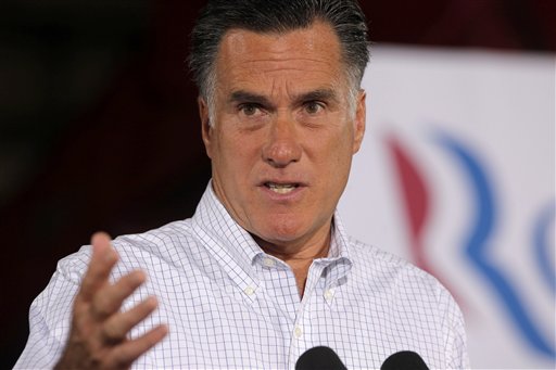 Republican presidential candidate Mitt Romney says that including charity contributions he's given up more than 20 percent of his income annually.