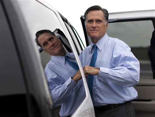 Republican presidential candidate, former Massachusetts Gov. Mitt Romney gets into his car to attend a fundraising event on Saturday, Aug. 18, 2012 in Nantucket, Mass. The Associated Press photo