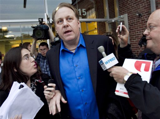 Former Boston Red Sox pitcher Curt Schilling departs the Rhode Island Economic Development Corporation headquarters in Providence, R.I., in May after he met with the agency to discuss the finances of his troubled video company.