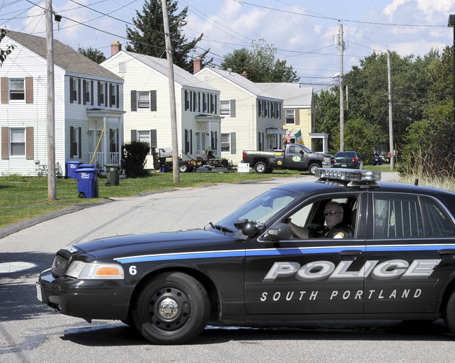 A police standoff ended peacefully at about 12:30 p.m. Tuesday in the Redbank neighborhood of South Portland. Police evacuated houses near 108 Macarthur Circle West, the second duplex from left.