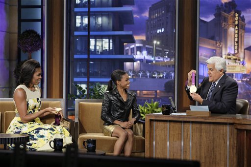 First lady Michelle Obama, left, Olympic gold medalist Gabby Douglas chat with host Jay Leno during "The Tonight Show with Jay Leno" on Monday.