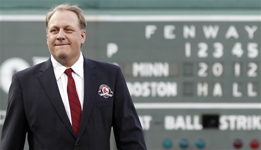 Former Boston Red Sox pitcher Curt Schilling looks on after being introduced as a new member of the Boston Red Sox Hall of Fame in this Aug. 3, 2012, photo.