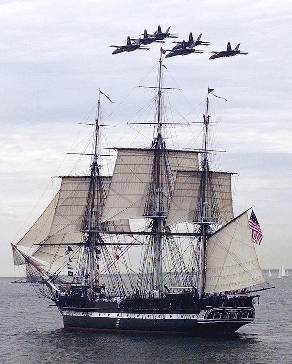 In this July 21, 1997 file photo, the Blue Angels fly in formation over the USS Constitution as she free sails off the coast of Marblehead, Mass., in celebration of her 200th birthday. The frigate, nicknamed "Old Ironsides," had not sailed on her own for more than 116 years. On Sunday, Aug. 19, 2012, the ship is scheduled to again raise sails on a cruise to mark the day two centuries ago when the Constitution bested the British frigate HMS Guerriere in a fierce battle during War of 1812. (AP Photo/Charles Krupa, File)
