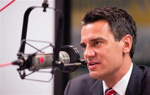 U.S. Rep. Kevin Yoder, R-Kan., apologizes to his constituents on the air during the "Up To Date" radio show on KCUR-FM on Monday morning, in Kansas City, Mo., after a published report revealed that the freshman lawmaker swam nude in the Sea of Galilee during a private fact-finding trip to the Mideast last August.