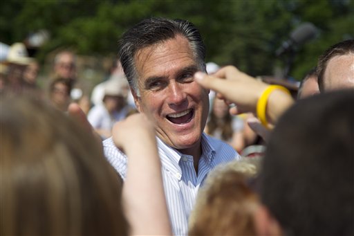 Republican presidential candidate, former Massachusetts Gov. Mitt Romney shakes hands during a campaign stop at Bavarian Inn Lodge on Tuesday, June 19, 2012 in Frankenmuth, Mich. (AP Photo/Evan Vucci)