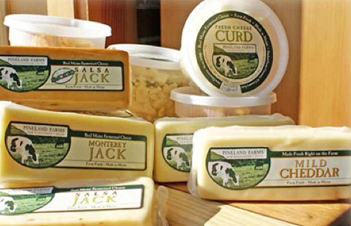 A display of Pineland Farms cheeses.