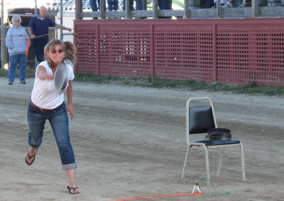 Margie Gray lines up the specially made skillet at a previous Blue Hill Fair tossing competition.
