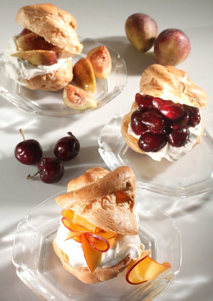 Pate a choux is a quick, easy dough to make that puffs up in the oven and is perfect for cream puffs that can be filled with peaches, cherries or figs, above, or for eclairs glazed in chocolate, below.