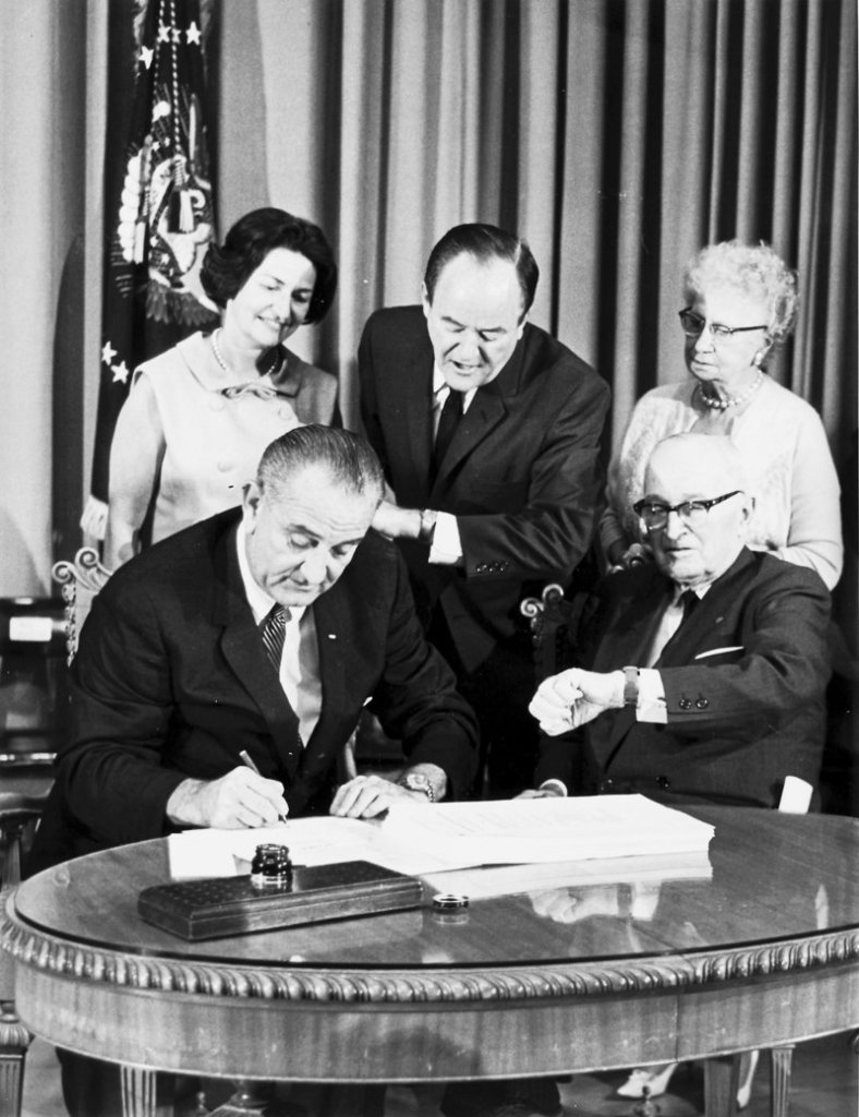 Forty-seven years ago, President Lyndon Johnson signed Medicare into law. The writers urge an immediate expansion of Medicare to everyone in the United States.