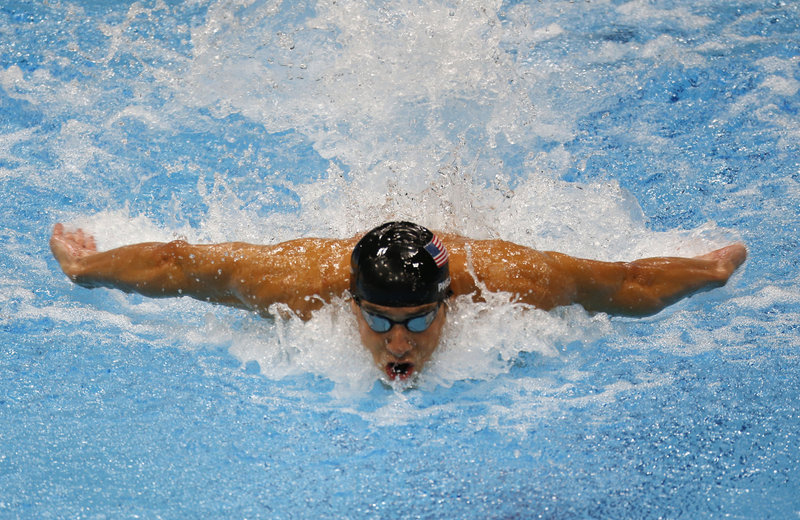 Michael Phelps surged ahead of the field in the final 50 meters Friday to win the 100-meter butterfly – his third straight Olympic title in the event and his 17th gold medal overall. Phelps is likely to pick up one more gold medal Saturday in his last race – the medley relay.