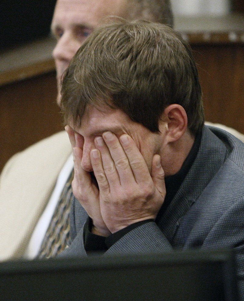 Plaintiff Kerry Lewis reacts to the verdict against the Boy Scouts in Portland, Ore., in 2010. He was awarded nearly $20 million after being abused by a troop leader in the 1980s.