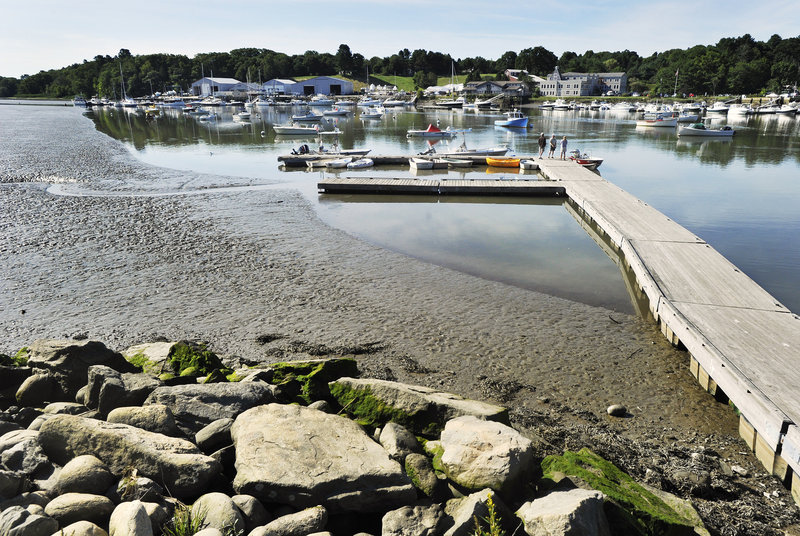 With Yarmouth Harbor going without a dredging project since 1995, the navigation channel and mooring areas dramatically shrink at low tide. Most of the town’s 16 lobstermen keep their boats outside the harbor to avoid getting stuck in the mud.