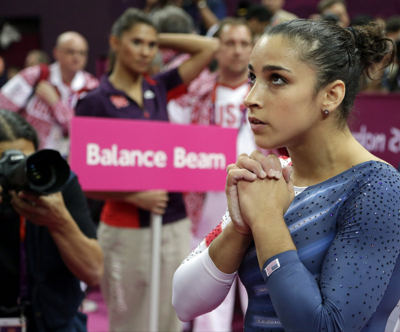 Aly Raisman watched the scores, finishing third in balance beam, but floor exercise was no contest Tuesday. Her performance was a stunner.