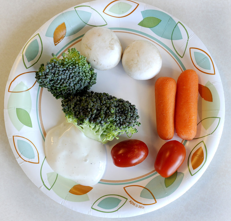 Veggies and ranch dip serve as the snack during a session of the program.
