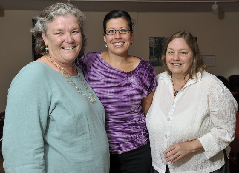 Board member Shelagh Smith, Bonnie Kremser and Leslie Allen, who helped with set construction.