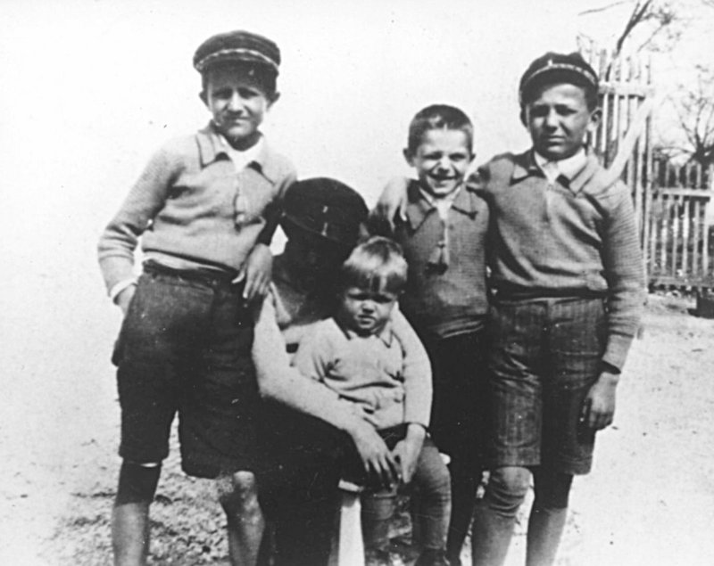 Schoolboy Veselin Kesich, right, with his three brothers and a friend in Banja Luka, former Yugoslavia, in the 1930s.
