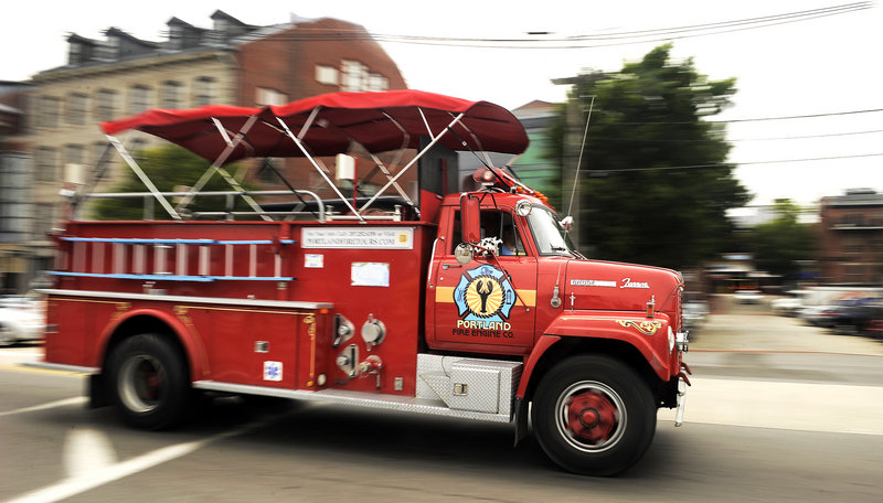 The International Harvester, which stops at the Spring Street Fire Museum on Wednesday and Friday afternoons, makes its way along Commercial Street.