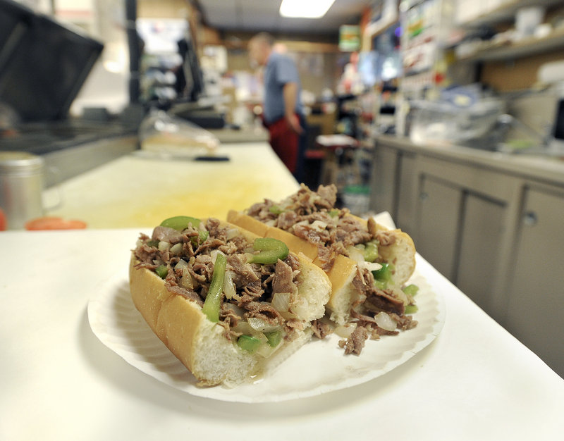 Over the years, the Mellen Street Market has served such items as a steak and cheese sub, shown in this 2014 photo. The market plans to add a cafe.