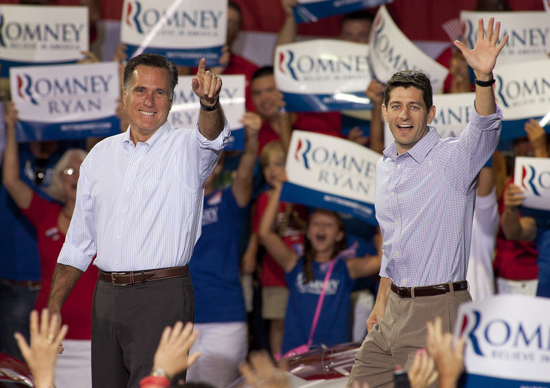 Republican presidential candidate Mitt Romney, left, campaigns with vice presidential running mate Rep. Paul Ryan, R-Wis., in Mooresville, N.C., on Sunday.