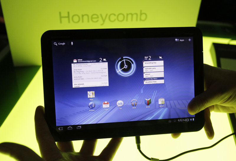 The Motorola Mobility Xoom tablet is displayed at Google headquarters. An analyst expects Google to have Motorola Mobility produce just a few smartphone designs per year.