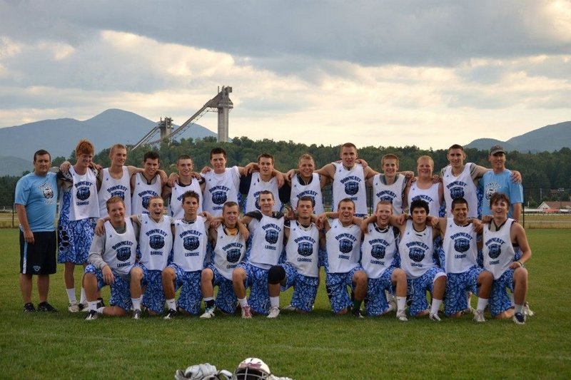 The Downeast Lacrosse team recently completed its summer schedule with a 15-3-1 record, including a 4-1 record at the Lake Placid Summit Lacrosse Classic. Team members, from left to right: Front row – Ben Bath (Kennebunkport), Tyler Jordan (Falmouth), Josh Cyr (Saco), Austin Doody (Scarborough), Christian Neelon (Scarborough), Brett Levasseur (Saco), Jake Desrochers (Alfred), Jack Sutton (Freeport), Jimmy Talbott (Gorham), Cody O’Brien (Moody Beach) and Peter Dyche (Freeport); Back row – Head Coach Tobey Farrington, Breandan Haley (Kennebunkport), Andrew Farrington (Scarborough), Matt Murphy (Scarborough), Corbin Cass (Alfred), Brendon Smith (Scarborough), Brad Gilbert (Falmouth), Svenn Jacobson (Cumberland), Steve Patrie (Lewiston), Pat Rimmer (Kennebunk), Nick Bath (Kennebunkport), Clayton Spang (Kennebunkport) and assistant coach Tom Talbott. Not pictured: David Crissione (Falmouth) and Charlie Fay (Falmouth).