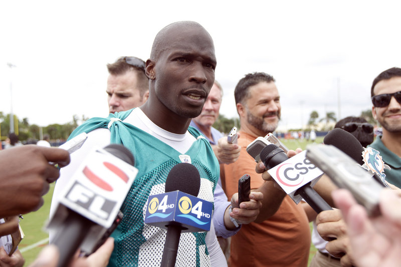 Miami Dolphin Chad Johnson, formerly known as Chad Ochocinco, talks to the media June 19 in Davie, Fla. The team dumped him a day after his arrest.