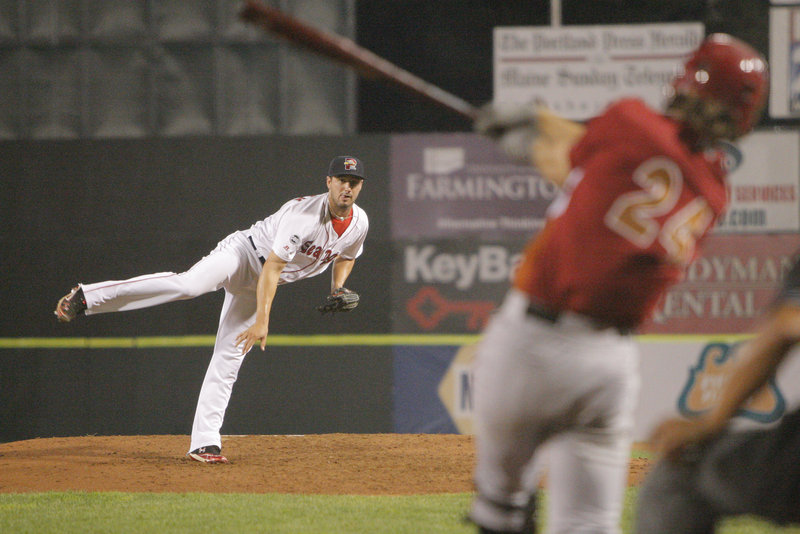 Sea Dogs pitcher Brandon Workman strikes out a batter in his first outing at the AA level.