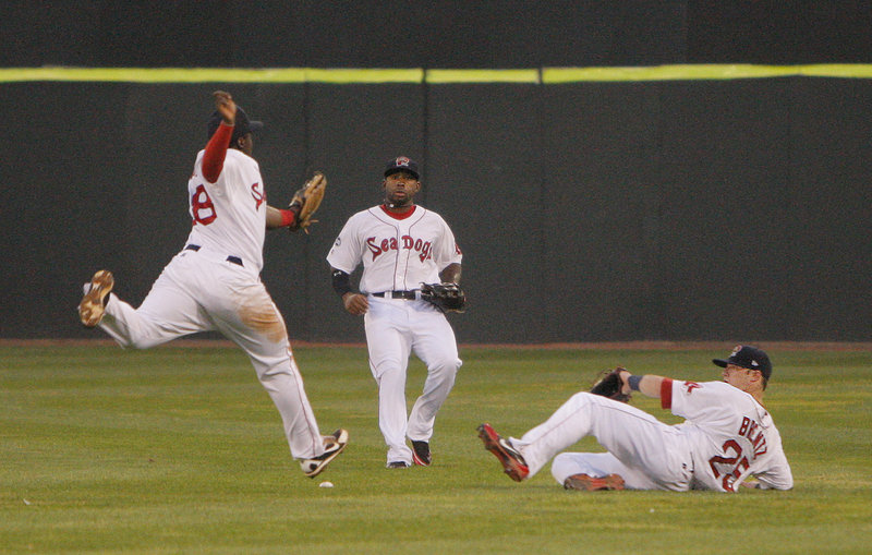 Second baseman Marquez Smith of the Portland Sea Dogs just misses catching a pop fly Wednesday night that drops as center fielder Jackie Bradley Jr. and sliding right fielder Bryce Brentz also can’t reach. Didn’t matter. The Sea Dogs beat Altoona 1-0 at Hadlock Field.
