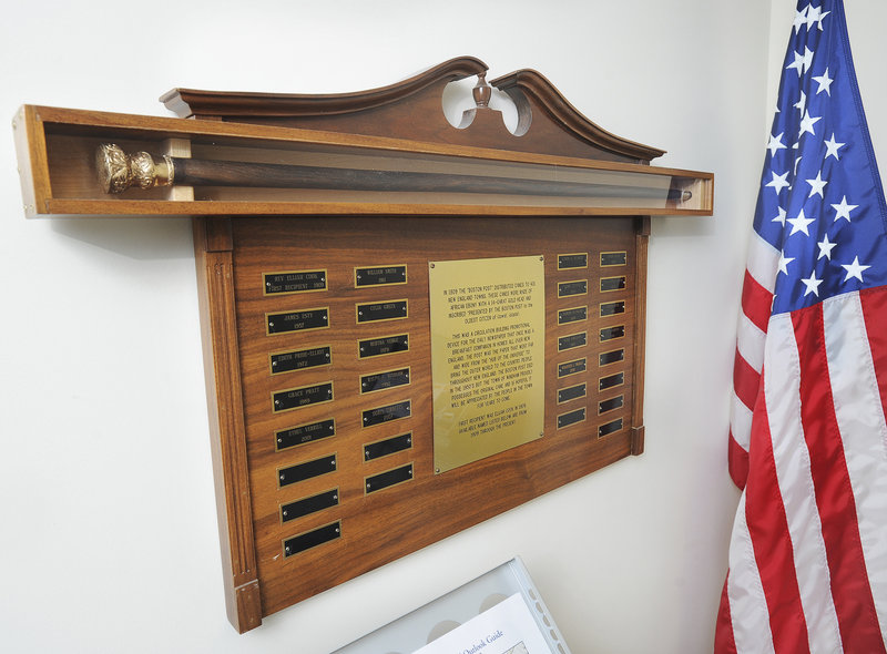 Windham’s original Boston Post cane is displayed in the town office with a plaque bearing the names of recipients.