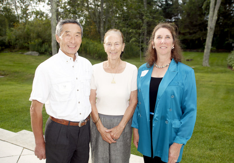 Tak Sato of Gorham, party hostess Milly Monks and Eugenia O’Brien, artistic director for Portland Ballet.