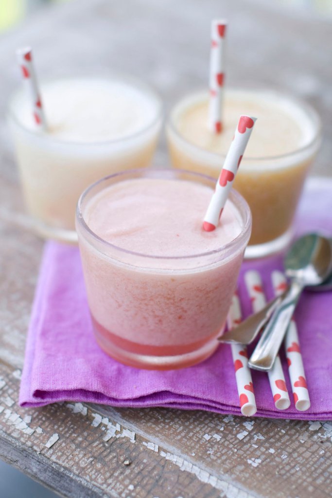 Coconut-Lemonade, Strawberry-Ginger-Limeade and Orange-Banana-Cinnamon slushies are a chilly, easy-to-make-at-home summer treat.