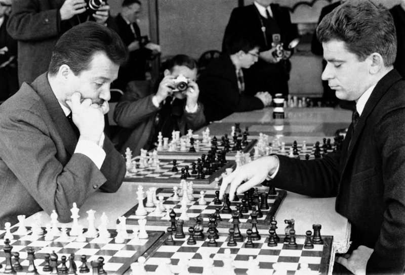 Svetozar Gligoric, left, of Yugoslavia and Boris Spassky of the USSR compete in the 1965 International Chess Congress in Hastings, England.