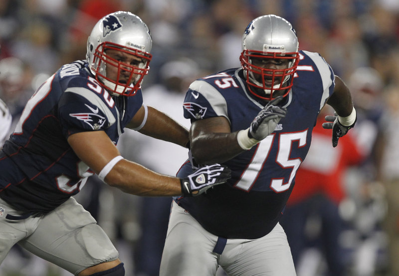 Rob Ninkovich, left, was moved to linebacker when he joined the Patriots in 2009, but this year he’ll be lining up next to Vince Wilfork as a defensive end.