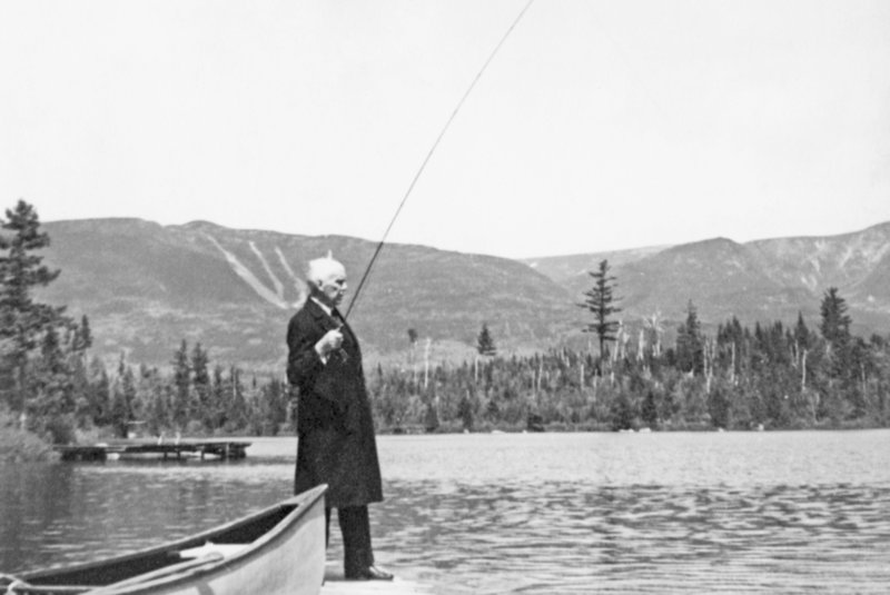 Gov. Percival Baxter fly fishes in Kidney Pond with Mount O.J.I. in the background at Baxter State Park, for which he donated the first parcel in 1931. The photo is from “Baxter State Park and Katahdin,” by John W. Neff and Howard R. Whitcomb.