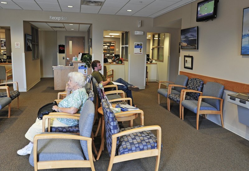 Patients sit in the waiting room at the new Mercy primary care clinic on Route 1 in Yarmouth.