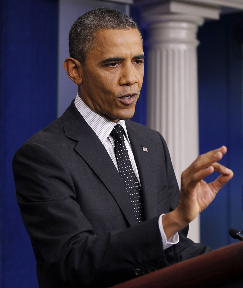 President Obama gestures while speaking in the White House briefing room in Washington on Monday. Obama defended the tone of his campaign for re-election.