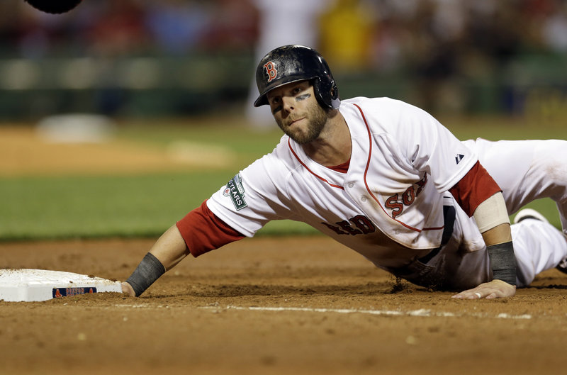 Dustin Pedroia of the Boston Red Sox gets back safely to first on a pickoff attempt Tuesday night during the 5-3 loss to the Los Angeles Angels at Fenway Park. The Red Sox, playing the team directly in front in the wild-card standings, have lost the opener in eight of their last 10 series.