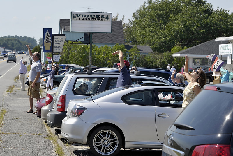 Parking lots at businesses along Bath Road in Brunswick filled with people checking out the U.S. Air Force’s Thunderbirds as they practiced Thursday for the Great State of Maine Air Show this weekend. The event, a boon to local business, takes place at Brunswick Landing.
