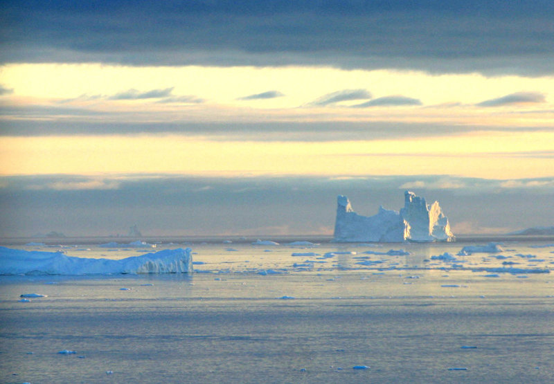 An iceberg is seen in Disko Bay, Greenland, above the Arctic Circle. Arctic sea ice reached a record low Monday.
