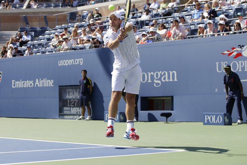 Andy Roddick returns a shot to fellow American Rhyne Williams, who was ranked 283rd, in the first round of play at the U.S. Open tennis tournament in New York on Tuesday.