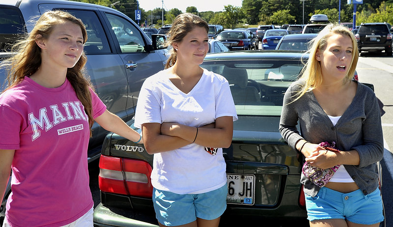 Eden Monsen, 17, left, Maddie Richardson, 17, and Danielle Kane, 18, all from Brunswick, give their opinions on the new driving laws during a shopping trip at the Maine Mall Wednesday.