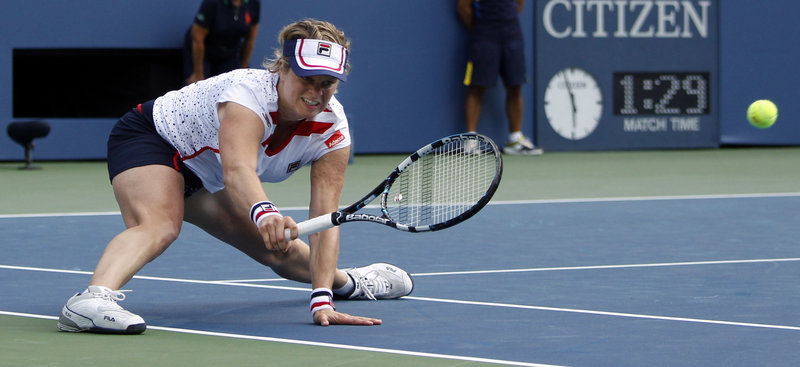 Kim Clijsters returns a shot against Laura Robson, 18, in the second round Wednesday at the U.S. Open. Robson ended Clijsters’ singles career with a 7-6 (4), 7-6 (5) victory. Clijsters, 29, had decided the U.S. Open would be her final tournament.