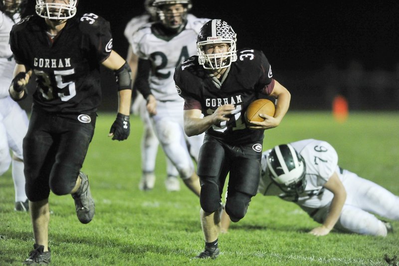 Matt McKenney of Gorham, carrying ball, may be hard to catch – he rushed for more than 1,000 yards a year ago – and the team will need it to spring upsets under new coach Jamal Chatman.