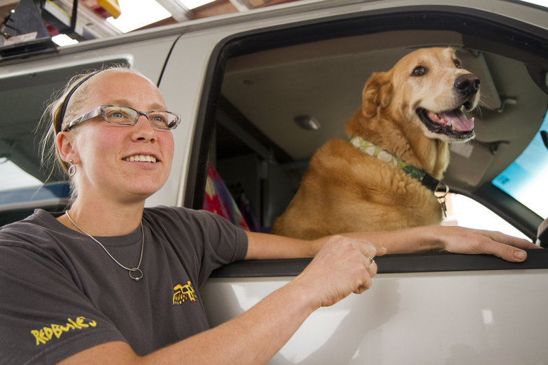 M.J. Reed of Pownal talks about the spike in gasoline prices as she and her dog stopped to fill up at a station in Portland. The average price for gas nationwide rose about 40 cents from July 1 to mid-August.