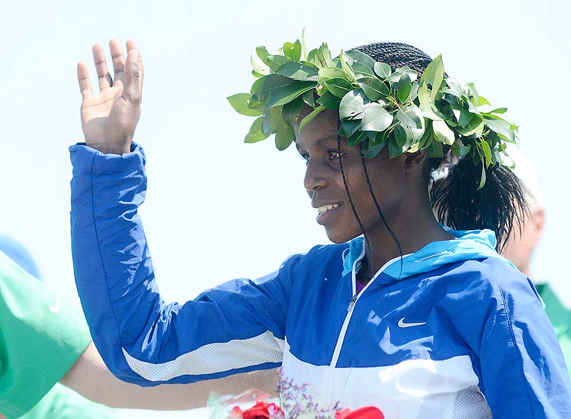 Margaret Wangari-Muriuki of Kenya is recognized at the awards ceremony after being the first woman to finish in Saturday's 2012 TD Beach to Beacon 10k in Cape Elizabeth.