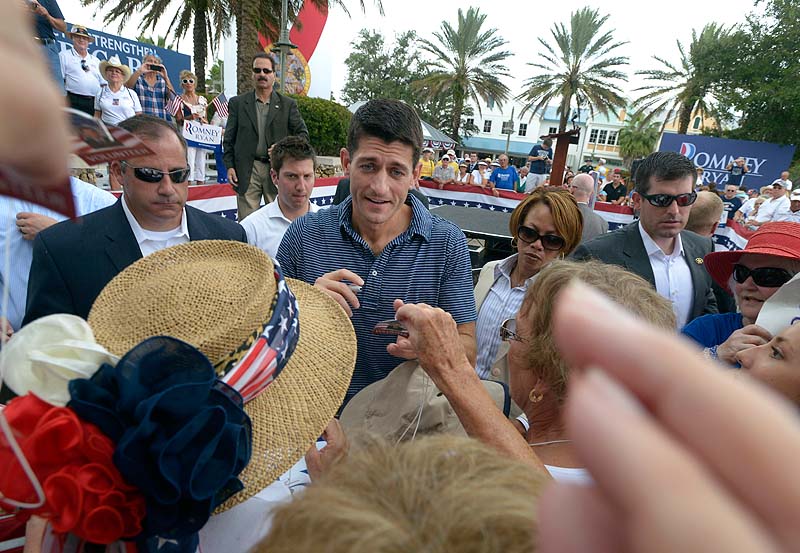 Republican vice-presidential candidate, Rep. Paul Ryan, R-Wis., center, greets the crowd after speaking at a campaign rally in The Villages, Fla., on Saturday.