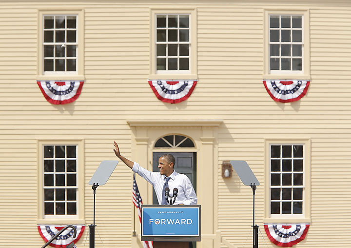 President Barack Obama waves to the crowd at the end of his speech in Portsmouth, N.H., on Friday.